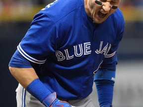 Toronto Blue Jays shortstop Troy Tulowitzki reacts after flying out to end the top of the sixth inning of a game against the Tampa Bay Rays in St. Petersburg, Fla., on April 30, 2016. (AP Photo/Phelan M. Ebenhack)