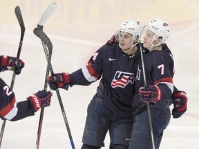 In this Jan. 5, 2016, file photo, Auston Matthews, left, celebrates a goal with a teammate during the IIHF World Junior Ice Hockey Championship bronze medal game against Sweden in Helsinki, Finland. (Markku Ulander/Lehtikuva via AP, File)