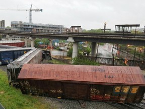 Several cars remain overturned after a CSX freight train derailed in Washington on Sunday, May 1, 2016. (DC Fire and EMS via AP)