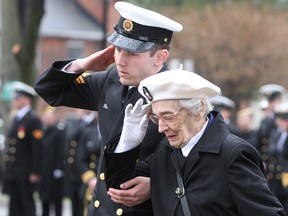 Veteran Joyce Smith, who served with the Women's Royal Naval Service during the Second World War, lays a wreath at the Battle of the Atlantic commemoration ceremony  at Navy Memorial Park in Kingston, Ont., on Sunday May 1, 2016. Steph Crosier/Kingston Whig-Standard/Postmedia Network