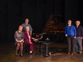 Jane Anema of Sarnia Community Foundation, Adam and Judith Alix of the Judith and Norman Alix Foundation, and Nora Boyd and Al McDowell of the Sarnia Concert Association are shown in this photo by Joan Elliott with the newly refurbished grand piano on stage at the Imperial Theatre. The $18,000 project carried out by the Sarnia Concert Association was supported by both foundations.