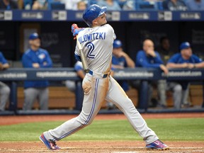 Toronto Blue Jays shortstop Troy Tulowitzki watches the flight of the ball after hitting a three-run home run during the ninth inning of a baseball game against the Tampa Bay Rays in St. Petersburg, Fla., Sunday, May 1, 2016. (AP Photo/Phelan M. Ebenhack)