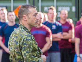 Lt.-Col. Tim Arsenault, commanding officer 3rd Battalion, Royal 22e Regiment, speaks to Canadian Armed Forces members during his visit to Glebokie, Poland on September 2, 2015 during Operation REASSURANCE. (Cpl. Nathan Moulton/Canadian Armed Forces)