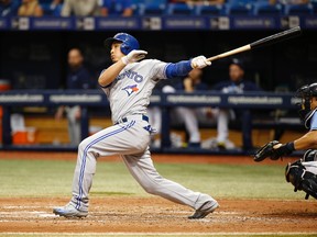 Darwin Barney of the Blue Jays hits a pinch-hit double during the ninth inning against the Tampa Bay Rays at Tropicana Field on May 1, 2016. He went on to score the winning run as the Blue Jays defeated the Tampa Bay Rays 5-1. (KIM KLEMENT/USA TODAY Sports)