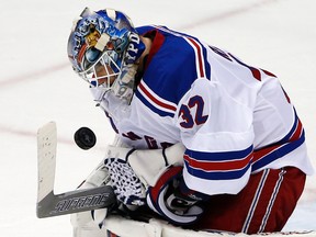 Rangers goalie Antti Raanta stops a shot during first round NHL playoff action against the Penguins in Pittsburgh on April 13, 2016. Raanta signed a contract extension with the Rangers on Monday, May 2, 2016. (Gene J. Puskar/AP Photo)