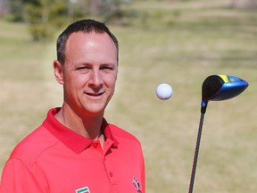 Derek Ingram, coach of the Canadian Olympic golf team, flips a ball in Winnipeg, Man. Monday May 2, 2016.