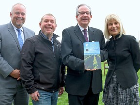 BRUCE BELL/THE INTELLIGENCER
The 2016 Wine Country Ontario Travel Guide was released at Closson Chase Vineyard in Hillier on Monday afternoon. Pictured (from left) are Prince Edward Hastings MPP Todd Smith, Closson Chase winemaker Keith Tyers, Jeff Leal, Minister of Agriculture, Food and Rural Affairs and Sylvia Augaitus, executive director of marketing of the Wine Marketing Association of Ontario. The Guide will be included in the summer issue of LCBOís Food & Drink magazine on May 4.