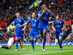 Leicester City's Wes Morgan celebrates scoring a goal against Manchester United during Premier League soccer action at Old Trafford in Manchester, England on Sunday, May 1, 2016. Leicester City claimed the league title on Monday after Chelsea and Tottenham played to a draw. (Reuters/Darren Staples/Livepic)