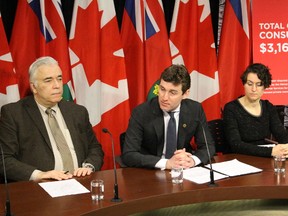 MPP Yvan Baker (centre) speaks about his private member's bill to ban door-to-door sales on Monday May 2, 2016 with Michael Janigan, from the Public Interest Advocacy Centre (left), and Lexy Fogel, (right) whose mother fell victim to a predatory door-to-door company. (Shawn Jeffords/Toronto Sun)