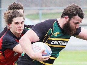 Centennial ballcarrier Curtis Courneyea plows forward against Bayside opposition during a recent senior boys rugby match at MAS Park. The annual Chargers Classic tournament is Thursday at MAS Park. (Submitted photo)