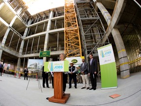 Premier Rachel Notley takes part in a press conference inside the under-construction Singhmar Centre for Learning, at NorQuest College, in Edmonton Alta. on Monday May 2, 2016. The provincial government is restoring $16 million in capital funding to NorQuest College in its 2016 budget. (David Bloom photo)