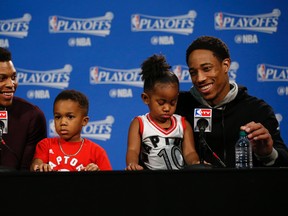 Toronto Raptors' Kyle Lowry and and DeMar DeRozan talk to the media after the club's Game 7 win at the Air Canada Centre in Toronto May 2, 2016. (Jack Boland/Toronto Sun/Postmedia Network)