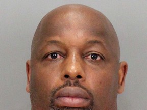 In this undated booking photo released by the Santa Clara County District Attorney is former NFL football player Dana Stubblefield. Prosecutors say they have charged former San Francisco 49er Dana Stubblefield with the rape of a "developmentally delayed" woman. The Santa Clara County District Attorney's Office says the 45-year-old Stubblefield was charged Monday, May 2, 2016, with sexually assaulting the woman last year at his Morgan Hill home. (Santa Clara County District Attorney via AP)