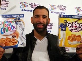 Toronto Blue Jay slugger Jose Bautista with boxes of cereal with his photo on the front on Monday May 2, 2016. (Dave Abel/Toronto Sun)