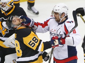 Washington Capitals forward Alex Ovechkin shoves Pittsburgh Penguins defenceman Kris Letang during the first period of Game 3 in an NHL playoff series at CONSOL Energy Center in Pittsburgh on May 2, 2016. (AP Photo/Gene J. Puskar)