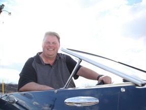 Sudbury Star ice-guessing contest judge Scott Hodgins, of Sudbury Boat and Canoe, has declared that Ramsey Lake is free of ice. Gino Donato/Sudbury Star/Postmedia Network