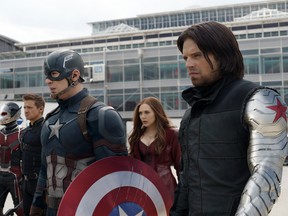 In this image released by Disney, Anthony Mackie, from left,  Paul Rudd, Jeremy Renner, Chris Evans, Elizabeth Olsen and Sebastian Stan appear in a scene from "Captain America: Civil War." (Photo courtesy of Disney-Marvel)