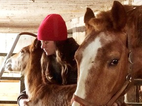 The 20th Mother’s Day Open House at Meeting Place Organic Farm near Lucknow takes place from 10 a.m. to 4 p.m. on Saturday, May 7 and 1-4 p.m. on Sunday, May 8. Pictured: Katrina McQuail is seen with a newborn foal at the farm. (Submitted)