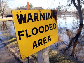 Intelligencer file photo
A sign warns of flooding in Foxboro in April 19, 2014. The committee created to help raise funds to assist with relief funding has disbanded.