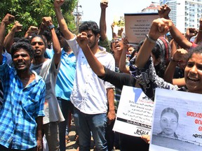 Indian protesters shout slogans during a demonstration against the rape and murder of a woman in Kochi on May 3, 2016. (STR/AFP/Getty Images)