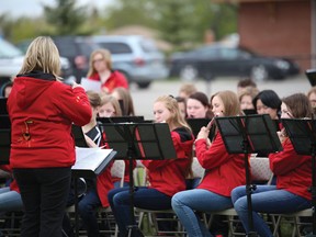 A 44-piece band from Sir John Franklin School in Calgary performed on a chilly April afternoon to the townspeople of Pincher Creek in Central Park. | Caitlin Clow photo/Pincher Creek Echo