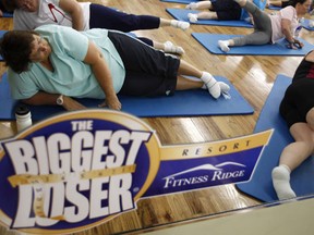 Guests work out before dawn at the Biggest Loser Resort in Ivins, Utah September 6, 2010. Guests at the resort affiliated with the popular reality television show work out in an aerobics room, a gym and a swimming pool for 6 to 7 hours each day. Picture taken September 6, 2010. (REUTERS/Rick Wilking)