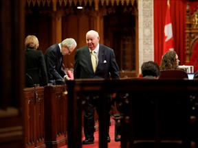 Senator Mike Duffy walks in the Senate chamber on Parliament Hill in Ottawa, Canada, May 3, 2016. REUTERS/Chris Wattie