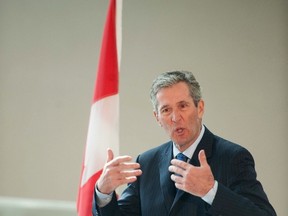 Brian Pallister speaks at The Canadian Museum of Human Rights after being sworn in as Manitoba premier in Winnipeg, Tuesday, May 3, 2016. THE CANADIAN PRESS/Mike Sudoma
