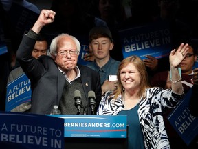 Democratic presidential candidate Sen. Bernie Sanders, I-Vt. and his wife, Jane O'Meara Sanders, wave after a campaign rally Tuesday, May 3, 2016, in Louisville, Ky. (AP Photo/Charlie Riedel)