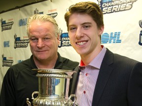 London Knights? head coach Dale Hunter stands with Knights? co-captain Mitch Marner, who won the Red Tilson Memorial Trophy Tuesday as the Ontario Hockey League?s most valuable player. (MIKE HENSEN, The London Free Press)