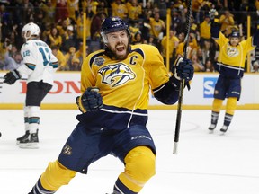 Nashville Predators defenceman Shea Weber celebrates after scoring a goal against the San Jose Sharks during the second period in Game 3 of an NHL playoff series in Nashville on May 3, 2016. (AP Photo/Mark Humphrey)