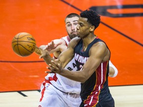 Miami's Hassan Whiteside battles Jonas Valanciunas of the Raptors in Game 1. (Ernest Doroszuk, Toronto Sun)