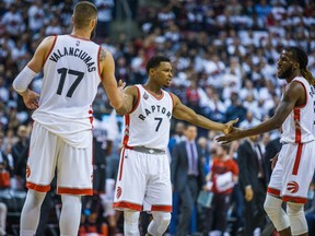 Toronto Raptors Jonas Valanciunas  (from left), Kyle Lowry and DeMarre Carroll  during 1st half action against Miami Heat during playoff game 8 in Toronto, Ont.  Tuesday May 3, 2016. Ernest Doroszuk/Toronto Sun/Postmedia Network