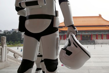 A fan dressed as a Storm Trooper from "Star Wars" reacts during Star Wars Day in Taipei, Taiwan, May 4, 2016. REUTERS/Tyrone Siu