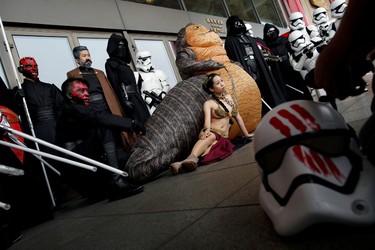 Fans dressed as the characters from "Star Wars" pose for photo during Star Wars Day in Taipei, Taiwan, May 4, 2016. REUTERS/Tyrone Siu