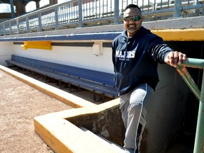 London Majors manager Roop Chanderdat stands next to the dugout at Labatt Park in London Ont. April 27, 2016. (CHRIS MONTANINI, Postmedia Network)