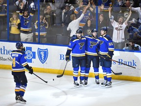 Blues centre David Backes (42) celebrates with teammates after scoring a goal against the Stars during the third period in Game 3 of the second round NHL playoff series in St. Louis on Tuesday, May 3, 2016. (Jasen Vinlove/USA TODAY Sports)