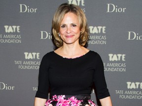 In this May 8, 2013 file photo, Amy Sedaris attends the Tate Americas Foundation Artists Dinner in New York.  Sedaris will be hosting a giveaway of artwork that once hung in Super 8 motel rooms. The art will be given away Wednesday evening at a Manhattan gallery, Openhouse. The brand is redecorating all of its rooms as it undergoes a transformation. (Photo by Charles Sykes/Invision/AP, File)