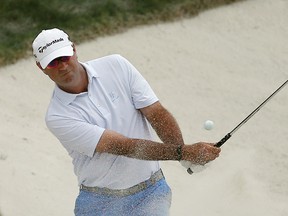 Stewart Cink hits out of the bunker on the 18th hole during the second round of the Arnold Palmer Invitational at Bay Hill Club and Lodge. (Reinhold Matay/USA TODAY Sports)
