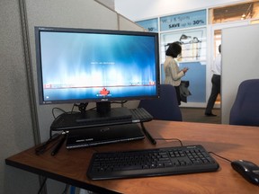 A Service Canada processing station is set up at Pearson International Airport in Toronto, Ont. on Tuesday, December 8, 2015 to provide social insurance numbers to the Syrian refugees arriving later this week. (THE CANADIAN PRESS/Darren Calabrese)