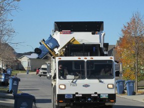 The city's current contracts on garbage collection end next year. (ADAM TREUSCH/WINNIPEG SUN FILE PHOTO)