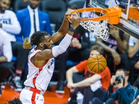 Toronto Raptors forward DeMarre Carroll dunks during OT action against the Miami Heat at the Air Canada Centre in Toronto on May 3, 2016. (Ernest Doroszuk/Toronto Sun/Postmedia Network)