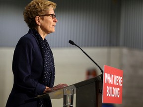 Ontario Premier Kathleen Wynne announces a $10 Million dollar investment to the Canadian Urban Transit research and Innovation Consortium, creating electric powered busses in Brampton, Ont. on Monday April 25, 2016. Brampton transit will be the first to test the new busses. Dave Abel/Toronto Sun/Postmedia Network