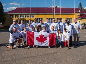 Members of Team Canada 2016 and Joint Task Force Ukraine following a 4-4 ball hockey game. (Supplied)