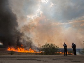 EDMONTON ALBERTA: May 4, 2016 Peace officers keep an eye on wildfires burning in Lac Ste Anne County,  Alberta near Alexis Nakota Sioux Nation on  May 4, 2016. People were evacuated and there are reports of property damage. AMBER BRACKEN/EDMONTON JOURNAL