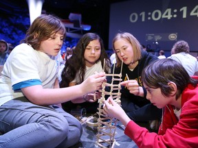 Alexander Public School students Kael Perras, left, Marissa Beland, Anne-Marie Sakki and Simon True-Robbie build a tower at the Rainbow District School Board Math, Science and Technology Olympics at Science North in Sudbury, Ont. on Thursday April 21, 2016. About 140 Grade 7 and 8 students from 15 schools participated in challenges, including math, science and technology skills and building a tower to hold a cup of water. John Lappa/Sudbury Star/Postmedia Network