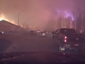 Amazing dashcam footage shot in Fort McMurray shows one man's escape from hell. (YouTube)