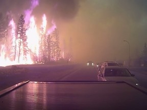 Amazing dashcam footage shot in Fort McMurray shows one man's escape from hell. (YouTube)