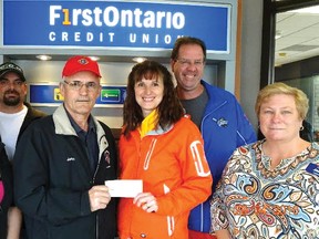 Tillsonburg Knights of Columbus recently donated $500 to the Dillon Park Initiative in Norwich. From left are Sue McCauley, Jason Swance, Grand Knight John Oliveira, Julie Fleet, Trevor Fleet, and Jane Haslinger, First Ontario Bank representative. (CONTRIBUTED PHOTO)