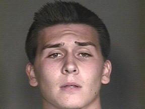 This undated booking photo provided by the Mesa Police Department, in Mesa, Ariz., shows Hunter Osborn. Arizona police say the high school student exposed himself in a football team picture that ended up in a yearbook handed out to some 3,400 students. (Mesa Police Department via AP)